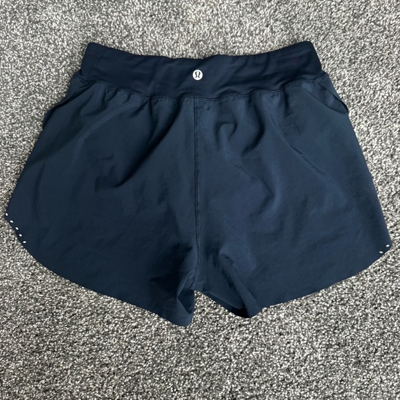 Lululemon Find Your Pace Lined High-Rise Short
3"'
True Navy
Size 4 - Picture 6 of 7